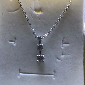 Silver necklace with three crystals